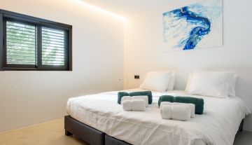 Resa Estates Ibiza villa for sale es Cubells modern heated pool bedroom.jpg